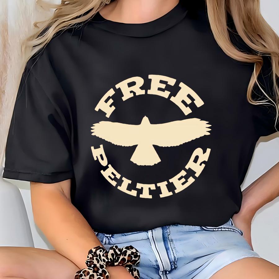 Shirt: Free Peltier T-shirt