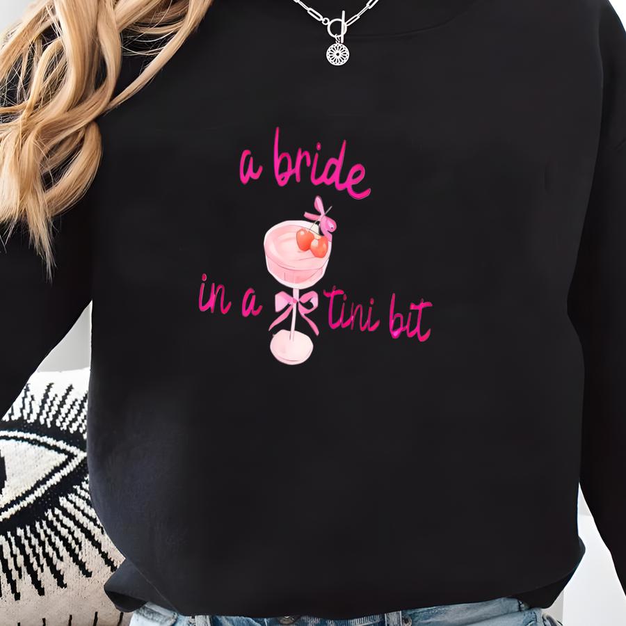 A Bride In A Tini Bit Baby Tee Dirty Martini Themed Bachelorette Party Dirty Martini Bride Baby Tee Dirty Martini Bachelorette Martini Bach Sweatshirt