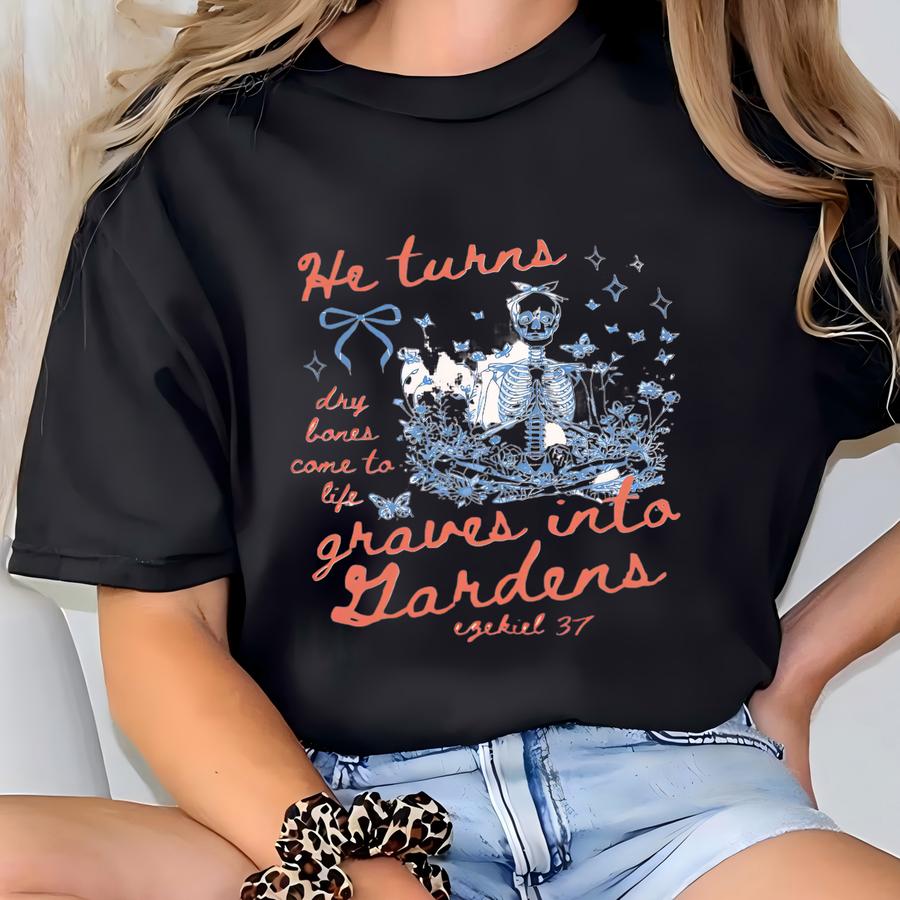 ® He Turns Graves Into Gardens Shirt Christian Halloween Shirt Bible Verse Shirt Coqette Skeleton Shirt Halloween Gift T-shirt