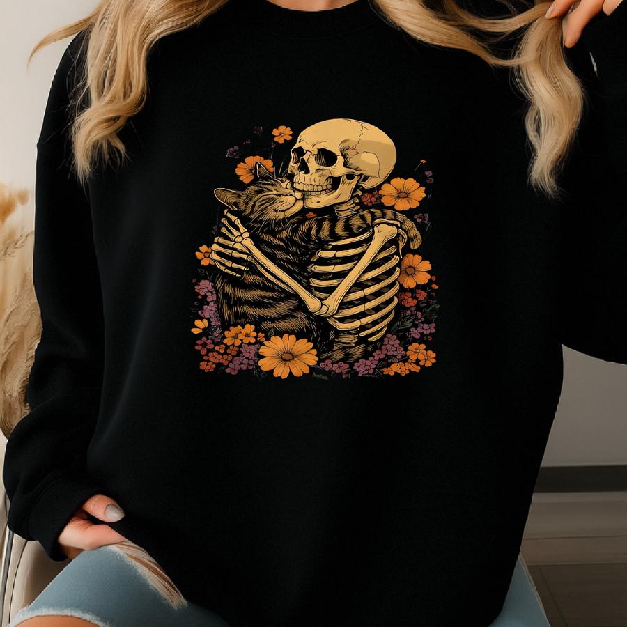 Skeleton Hugging Cat Floral Halloween Comfort Shirt Cute Spooky Unisex Shirt – Unique Gift Idea For Cat Lovers Sweatshirt