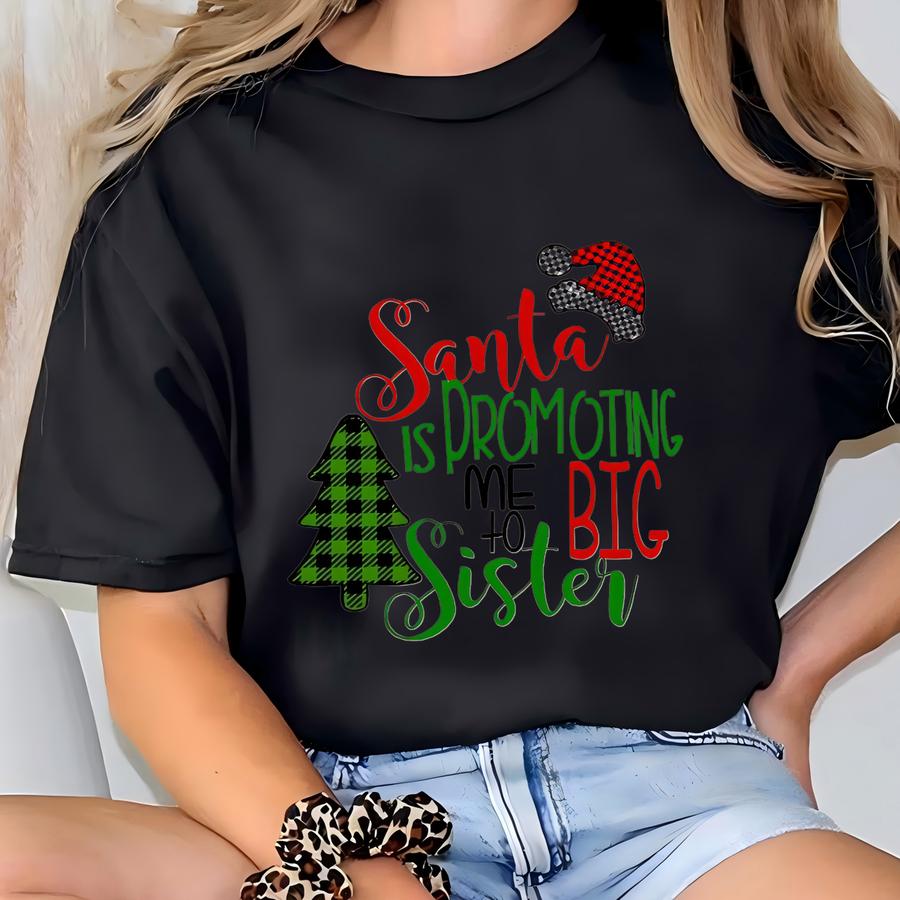 Santa Is Promoting Me To Big Sister Christmas Shirt | Holiday Pregnancy Reveal | Toddler Youth Christmas Outfit | Ships Next Day T-shirt